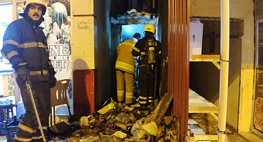 Marketin deposunda çıkan yangın hasara neden oldu