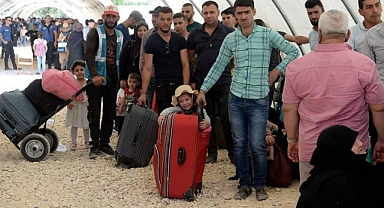 ALMANYA, ÜLKELERİNE GERİ DÖNMEK İSTEYEN SURİYELİLERE MALÎ DESTEK VERMEYİ PLANLIYOR