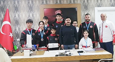 KAYMAKAM BAŞARILI SPORCULARI AĞIRLADI