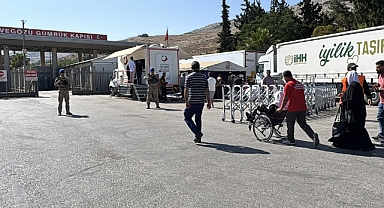 Okulların kapanmasıyla Türkiye'deki Suriyelilerin ülkelerine dönüşleri yoğunlaştı