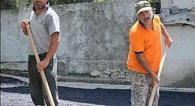 65 Derece Asfalt Üzerinde Fedakârlıkla Çalışıyorlar