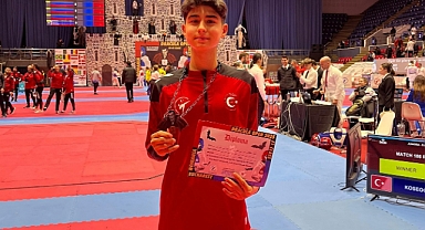 TECİMEN BAŞARILI SPORCUYU KUTLADI